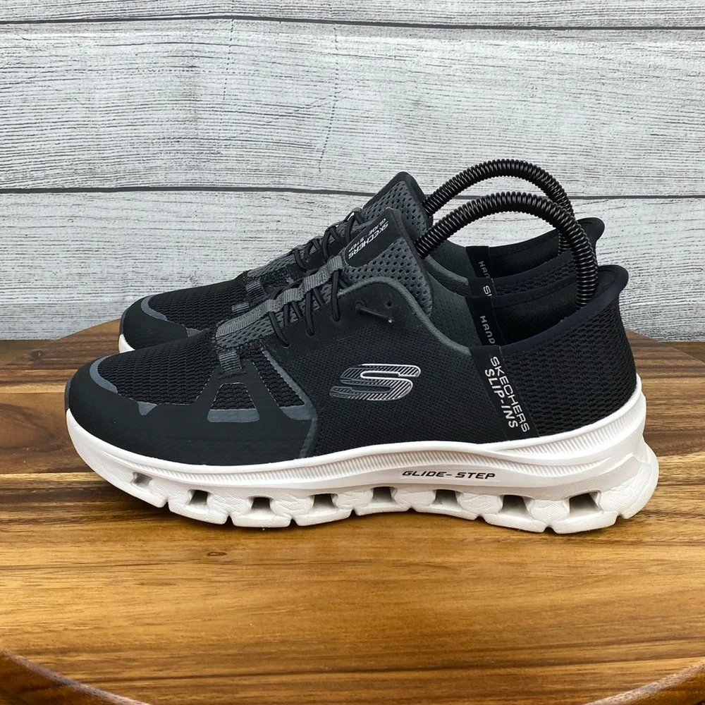 Skechers Black and White Athletic Shoes - Picture 1 of 12